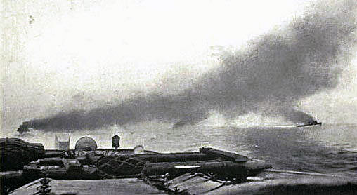 Commencement of the Battle of Jutland on 31st May 1916. British battle cruisers are in the distance behind the smoke line: contemporary photograph taken from the light cruiser HMS Champion